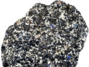 Gabbro Gabbro rock hand sample showing coarse-grained phaneritic texture with dark pyroxene and light plagioclase crystals.